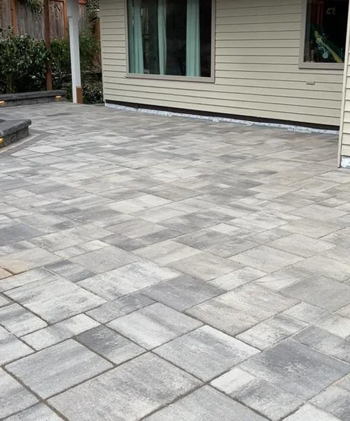 Installation of pavers. Retaining wall. Children's play area and installation of lights in Snohomish 
